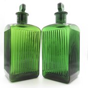 A Matched Pair Of Large Green Poison Bottles