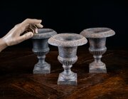 Three Miniature Cast Iron Urns