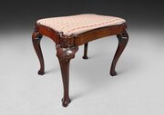 A Mid 18th Century Mahogany Stool Of Serpentine Shape