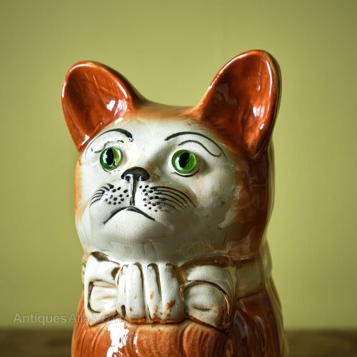 Antiques Atlas - Pair Of Staffordshire Pottery Glass-Eyed Cats
