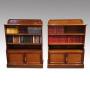 Pair of Edwardian walnut open bookcases