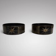 A Pair Of Regency Papier Mache Wine Coasters