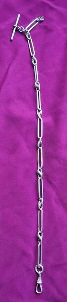 A Silver Trombone Pocket Watch Chain