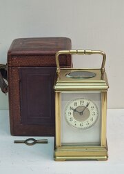 A Striking Carriage Clock & Box