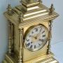 A Victorian Brass Mantel Clock