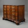 18thc Continental mahogany commode of oxbow form