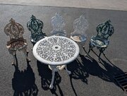 Unusual Listing  Castiron Table with Five Chairs