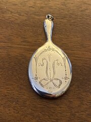 A Small Silver Flirting Mirror