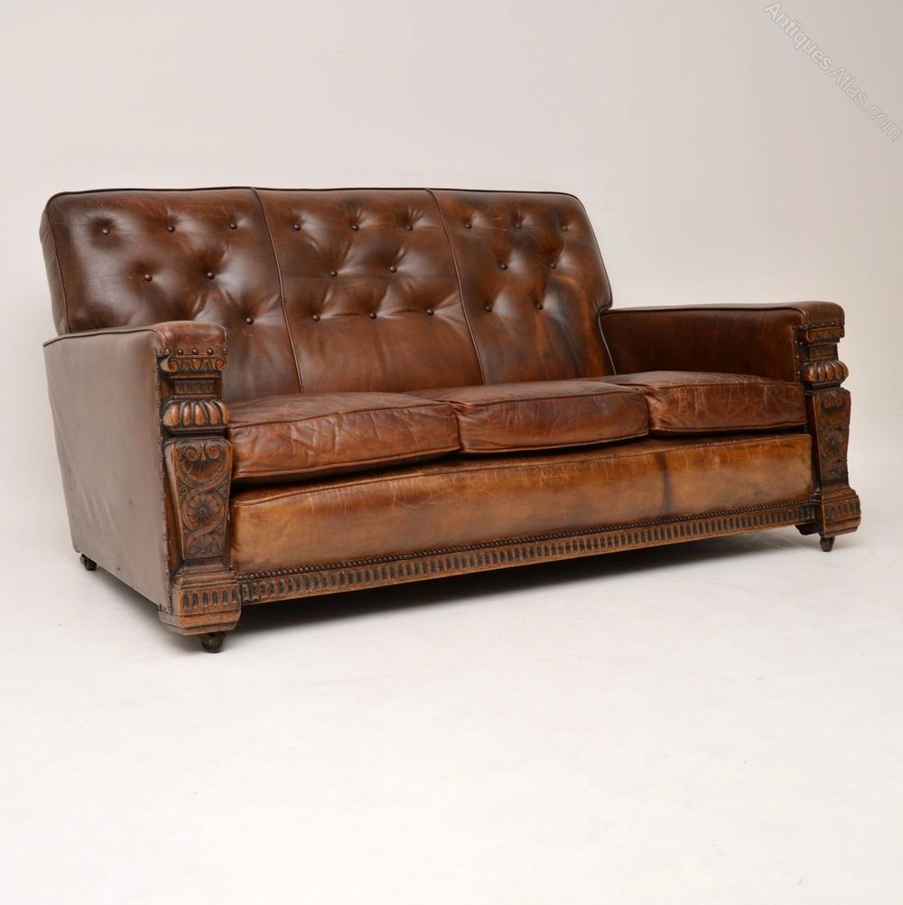 Antique Leather Upholstered Carved Oak Sofa