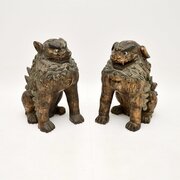 Pair Of Antique Chinese Carved Wooden Dog Statues