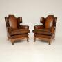 Pair of Antique Leather Wing Back Armchairs