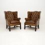 Pair of Antique Leather Wing Back Armchairs