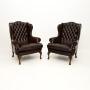 Pair of Antique Leather Wing Back Armchairs