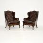Pair of Antique Leather Wing Back Armchairs