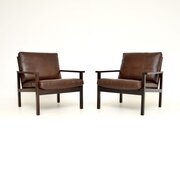Pair Of Danish Rosewood And Leather Armchairs