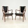 Pair of Rosewood and Leather Armchairs by AJ Milne