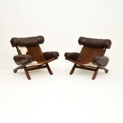 Pair Of Vintage Cow Hide Leather Armchairs
