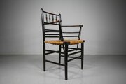 A True Antique Sussex Chair By William Morris