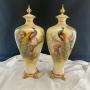 Royal Worcester Pair of vases signed A Shuck