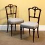 A Pair of 19thc. Walnut Side Chairs
