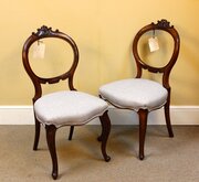 A Pair Of Walnut Balloon Back “Bedroom” Chairs
