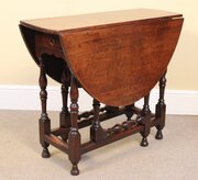 An Early 18thc. Walnut Gate Leg Table