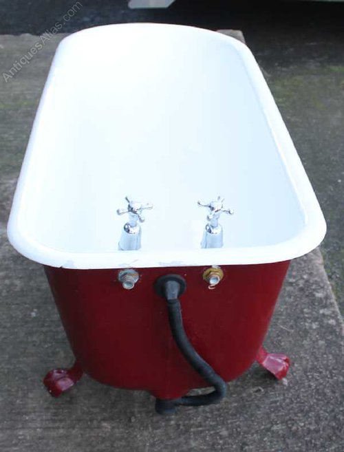 Antiques Atlas Cast Iron Bath Deep Red On Claw Feet.