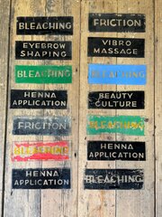 Set Of 14 Reverse Painted Glass Beautician Signs  
