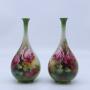A pair of Hadleys Royal Worcester vases, 1907