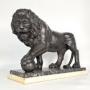 A very large classical sculpture of a Medici lion