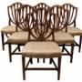 A Set of Six George III Mahogany Shield Back Dinin