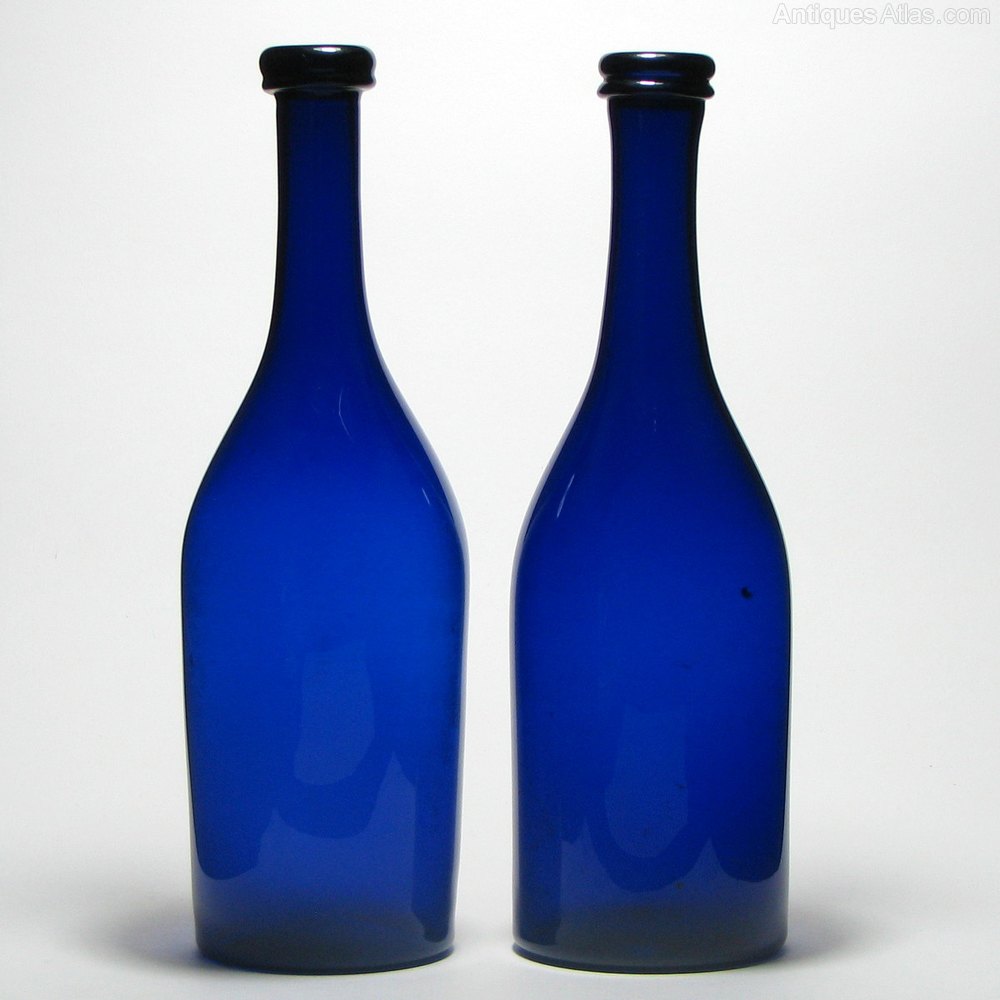 Antiques Atlas Pair Of Blue Glass Serving Bottles C1840