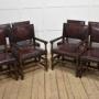 Eight Leather Upholstered Oak Dining Chairs