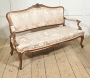 Louis XV Style Carved Walnut Settee With Damask Upholstery 