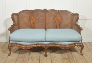 Louis XV Style Carved Walnut And Cane Settee