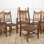 Set of eight oak Arts and Crafts dining chairs