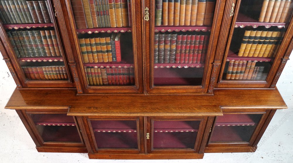 Victorian Oak Breakfront Bookcase, Attrib. Maples Antiques Atlas