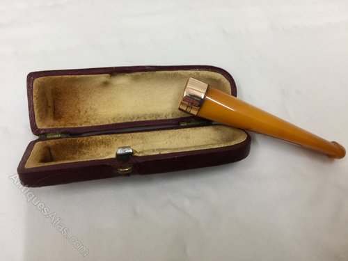 Antiques Atlas - Antique Butterscotch And Gold Cigarette Holder