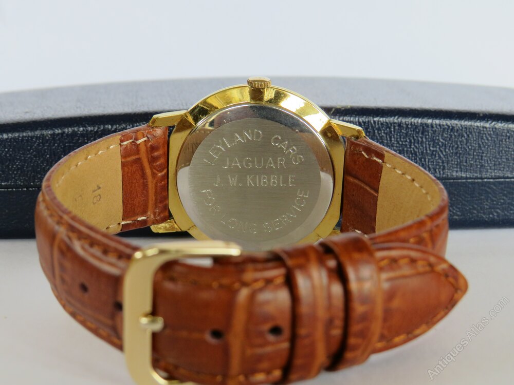 Montre Mécanique Garrard Suisse - Édition Jaguar/Leyland Cars, Boîtier Jaune, Bracelet Cuir, Occasion Fonctionnelle