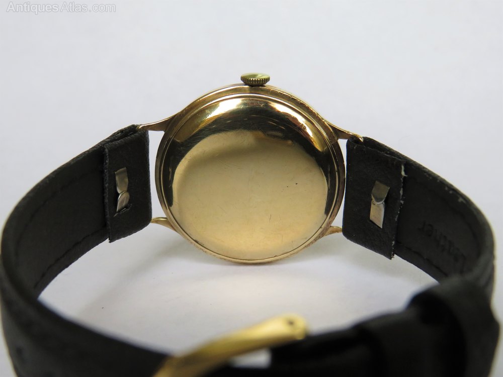 A unisex gold vintage Avia wrist watch