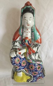 Famille rose porcelain figure