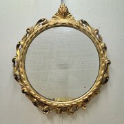 18th century carved gilt wood round mirror