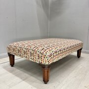 Large antique ottoman stool in geometric fabric