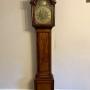 George III oak arched face long case clock
