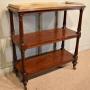 William IV mahogany three tier whatnot