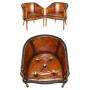 Pair of restored Davenport barrel back armchairs 