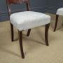 This is a fine quality antique English Georgian Regency pair of dining chairs  constructed of solid mahogany