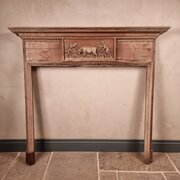 A 19th Century Carved Fire Surround.