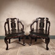 A Pair Of 20th Century Chinese Armchairs.