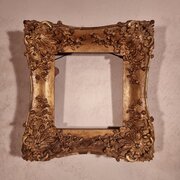 A Small 19th Century Gilt Gesso Swept Frame. 
